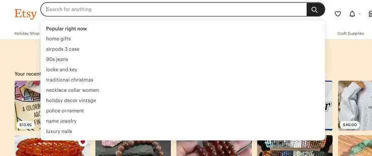 Screenshot of Etsy search autocomplete showing keyword suggestions.